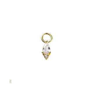 Gold pendant with a clear gemstone on a white background