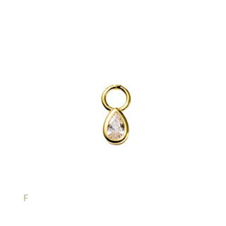 Gold teardrop-shaped pendant on a white background